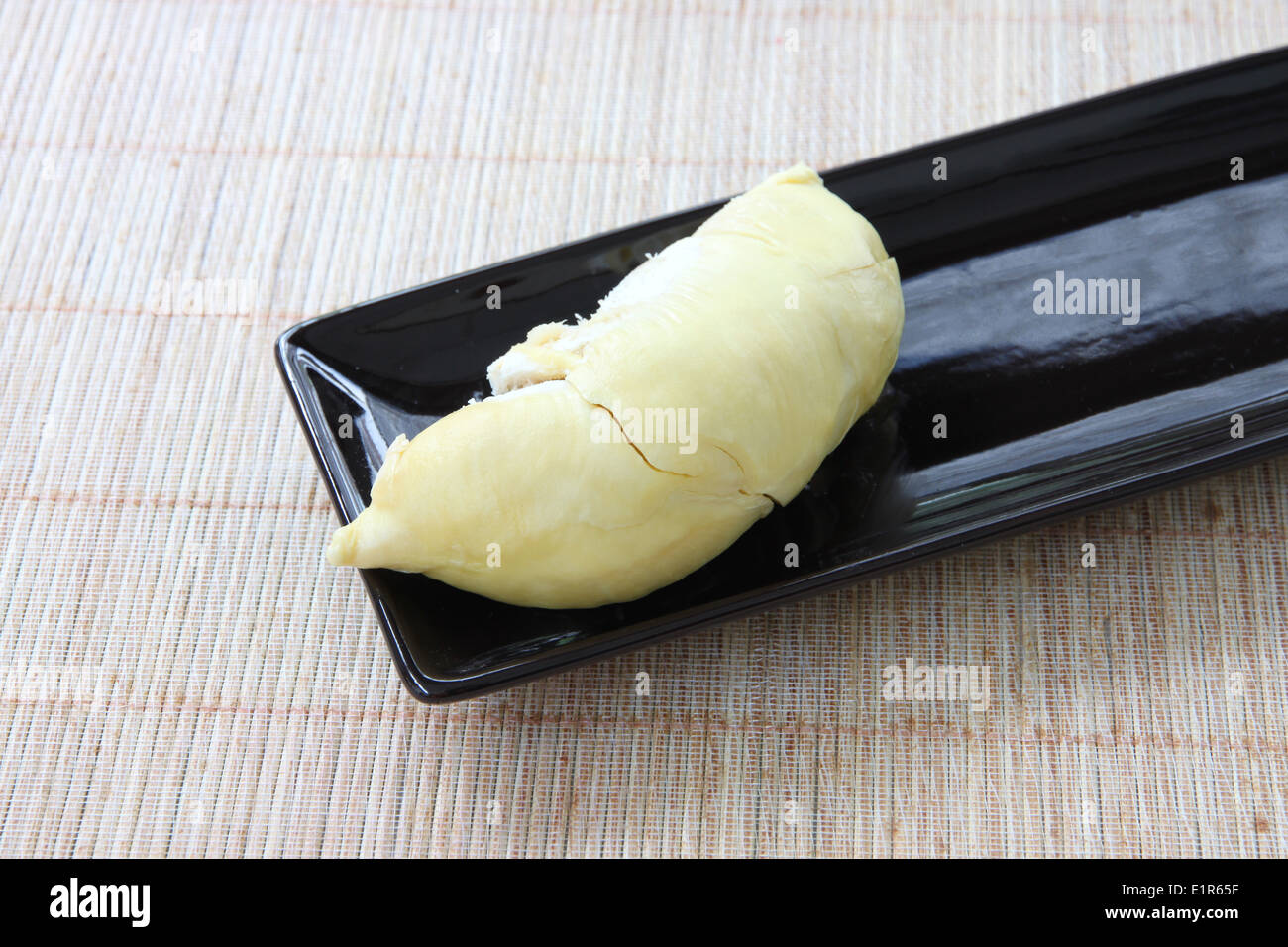 Fleisch-Durian tropische Früchte in der schwarzen Schale. Stockfoto
