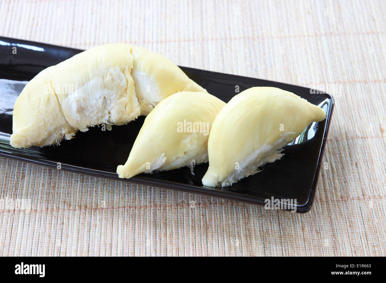 Fleisch-Durian tropische Früchte in der schwarzen Schale. Stockfoto