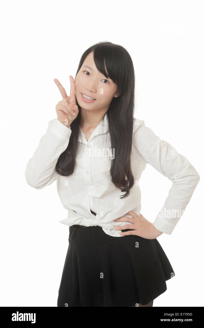 Eine schöne Chinesin einige Haltung isoliert auf einem weißen Hintergrund anzeigen Stockfoto