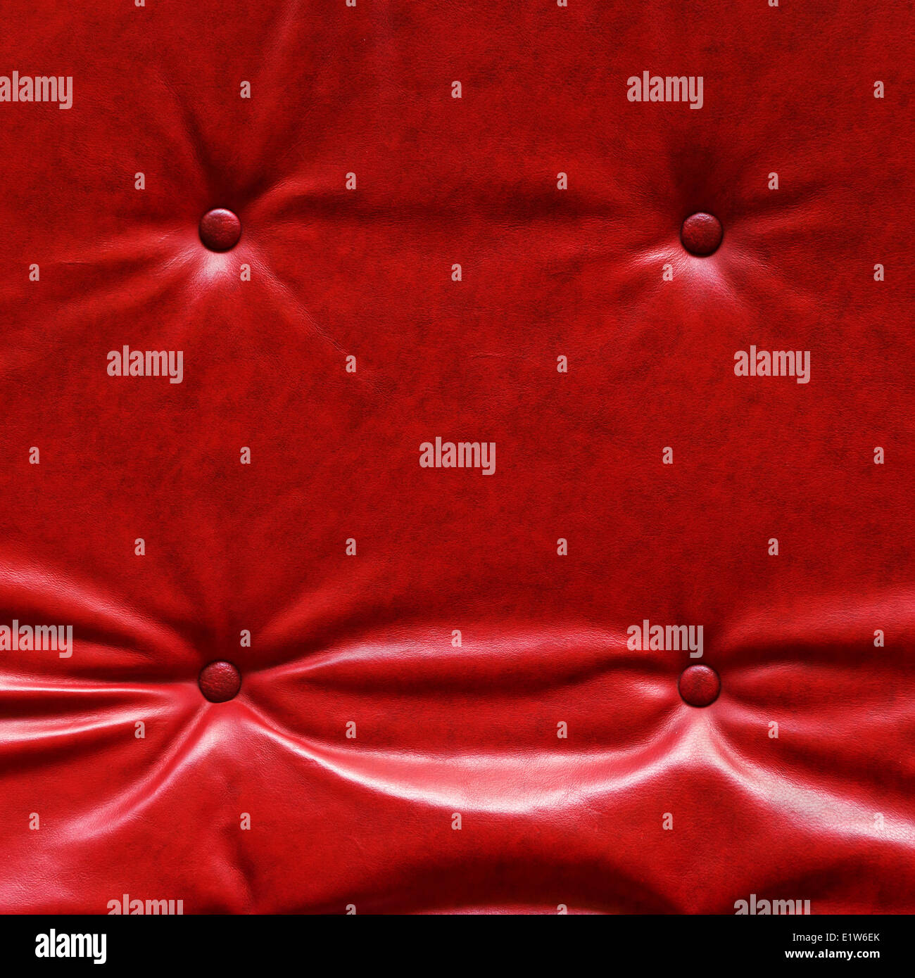 Geknöpfte Polsterung Leder rot Texturen als Hintergrund. Stockfoto