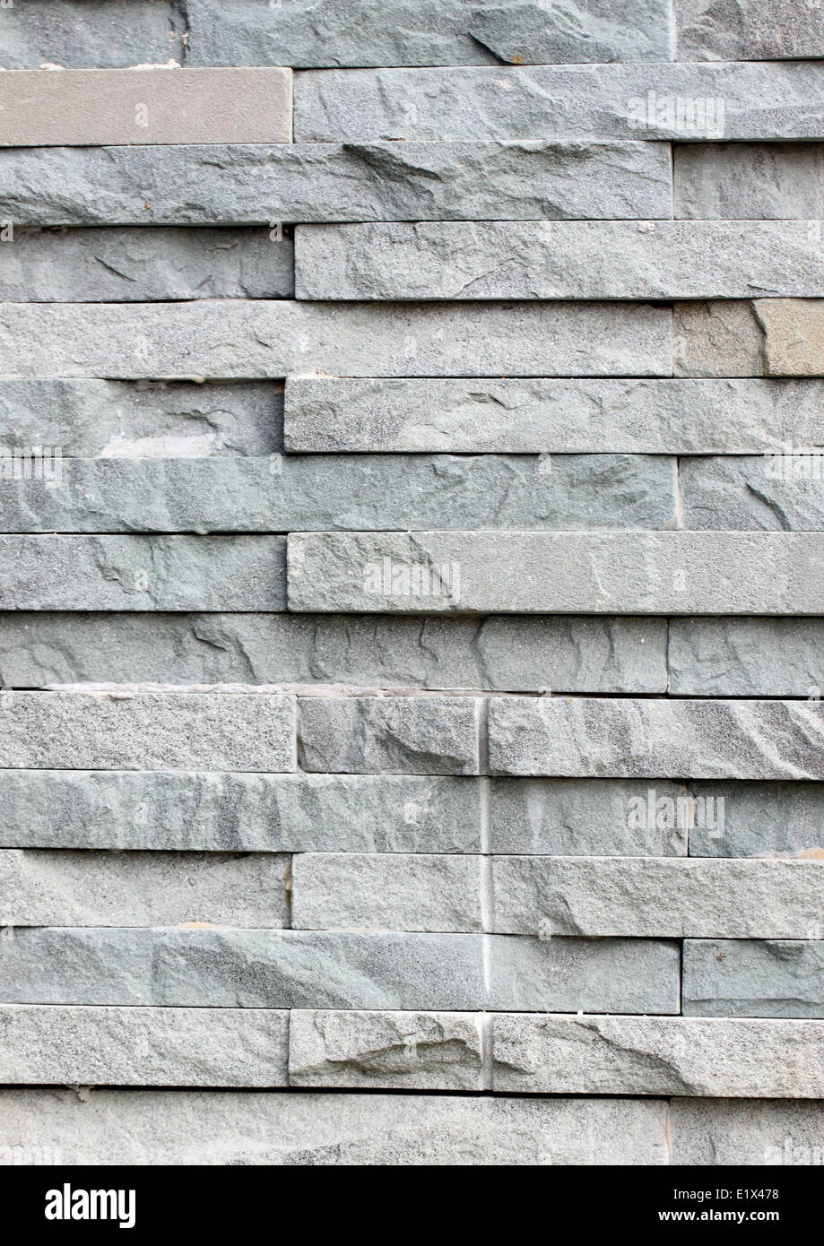 graue Steinplatte Stil im Innenraum für Hintergrund angeordnet. Stockfoto