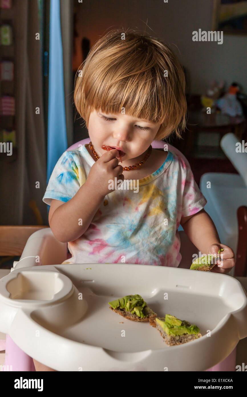 Baby Essen lernen Stockfoto