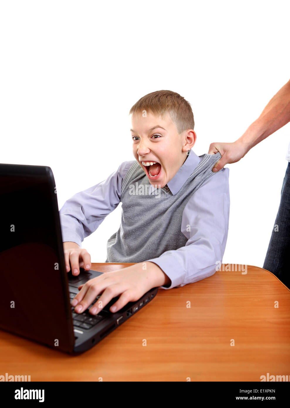 Eltern, Sohn von Laptop zu ziehen Stockfoto