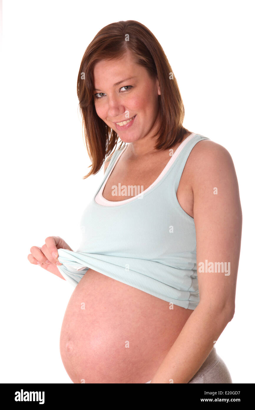Schwangere Frau lächelt Stockfoto