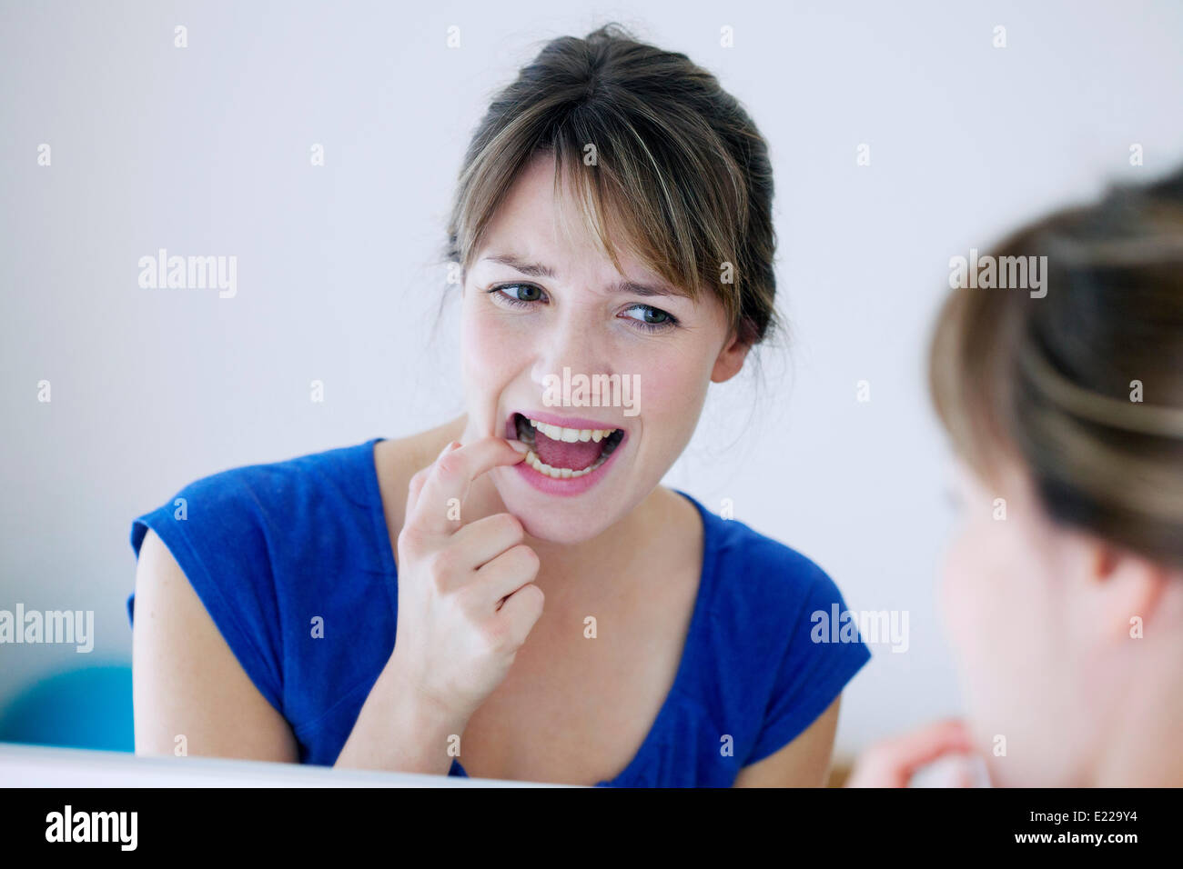 Frau mit Zahnschmerzen Stockfoto