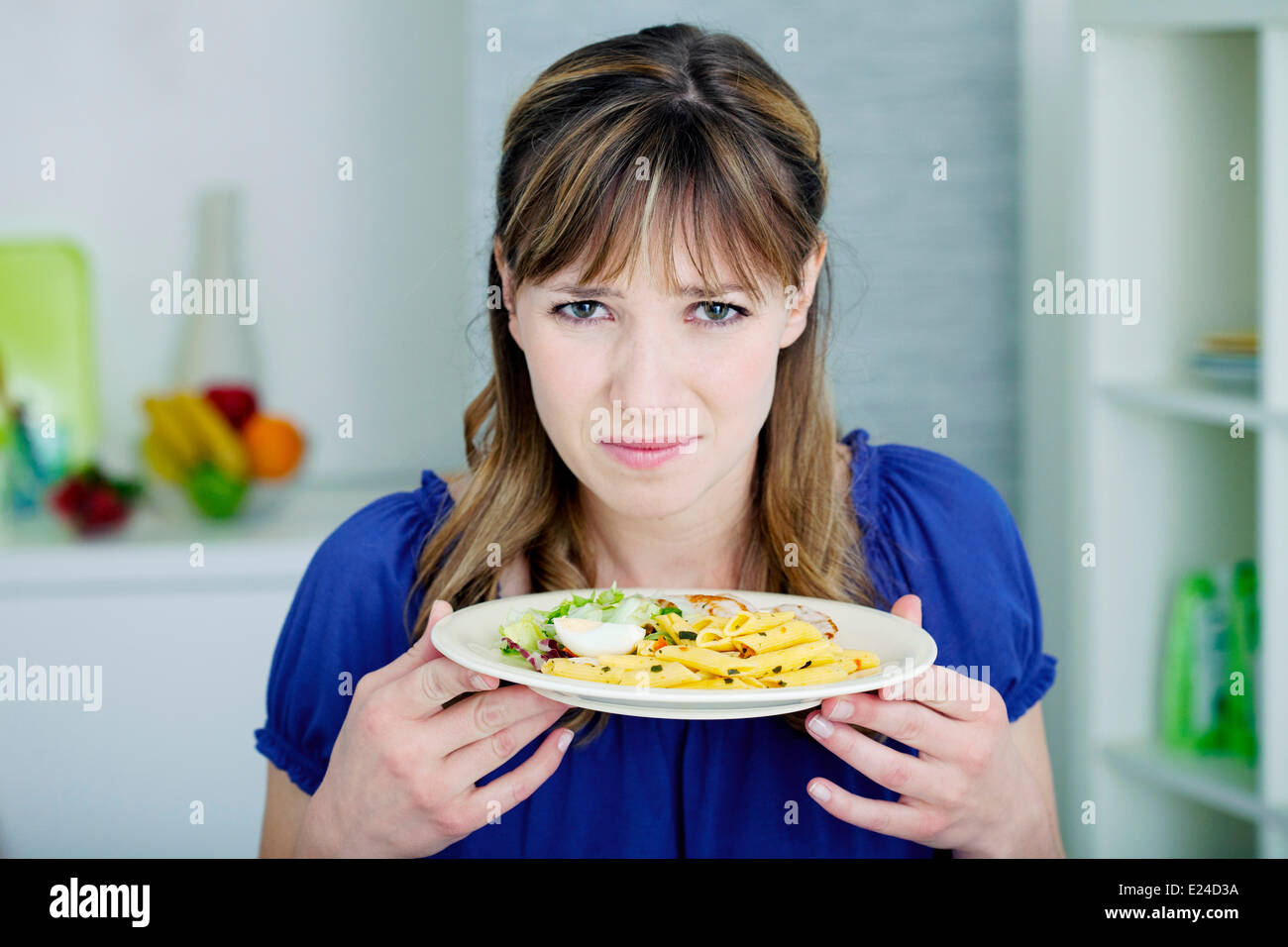 Frau mit einer Mahlzeit Stockfoto
