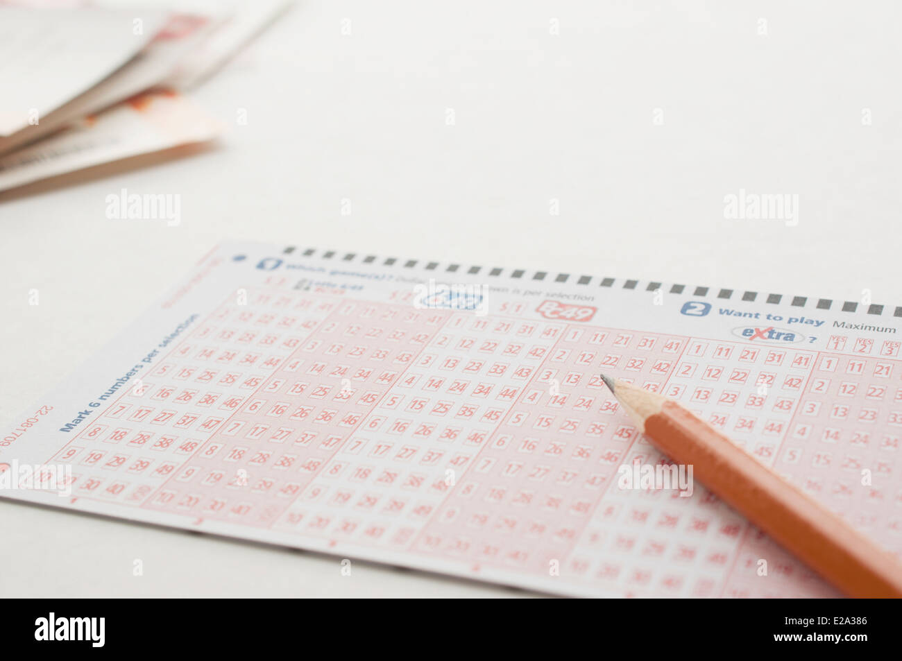 Stift auf Lottoschein hautnah Stockfoto