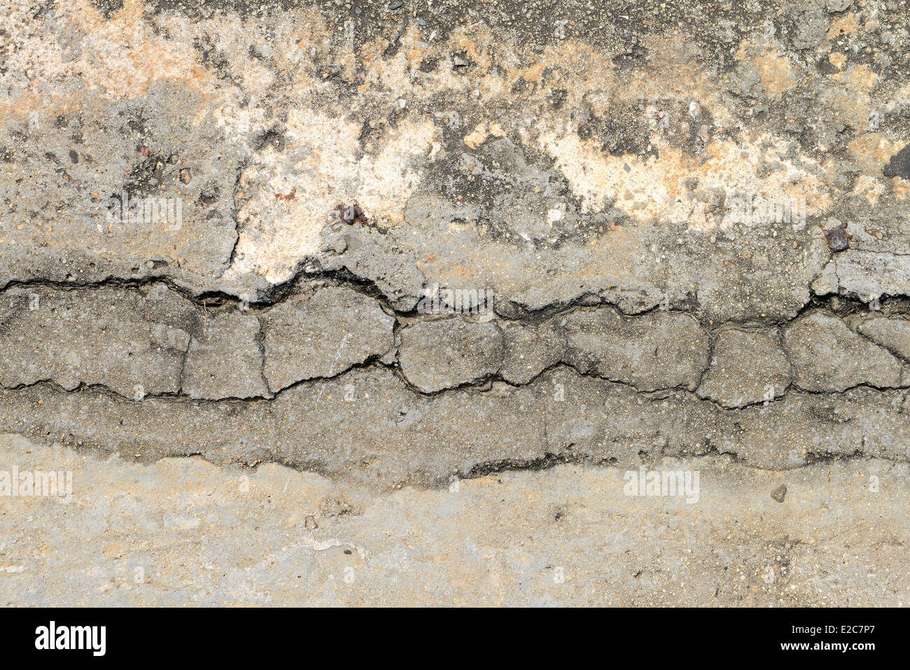 Zusammensetzung des gerissenen Beton Textur Closeup Hintergrund. Stockfoto