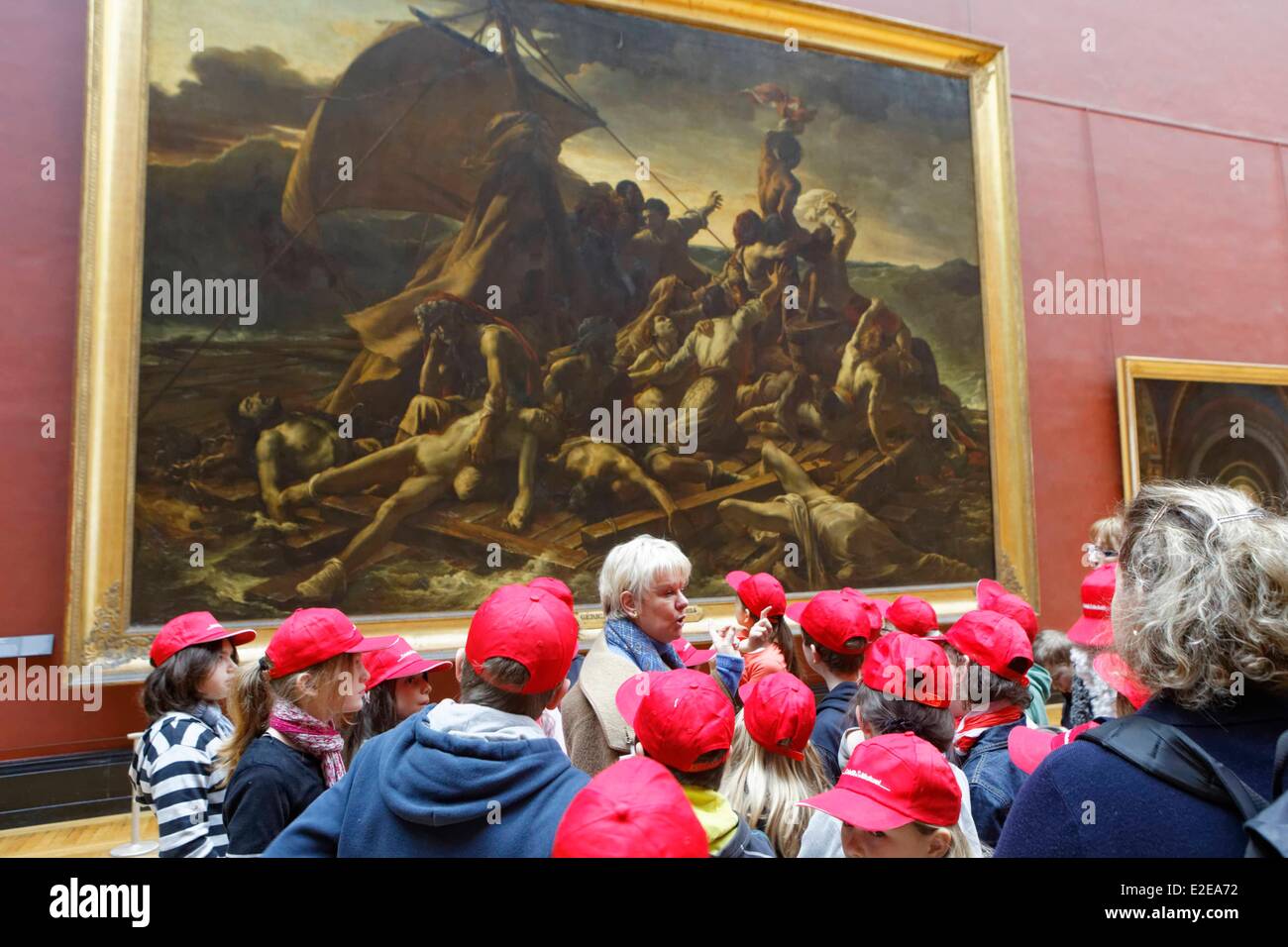 Frankreich, Paris, Kinder und Führer in Schrift Le Flosses De la Meduse von Gericault, in den Louvre große Galerie Stockfoto