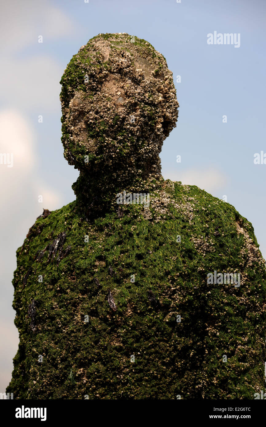 Ein weiterer Ort, Kunstinstallation, Anthony Gormley Statuen auf Crosby Strand Stockfoto