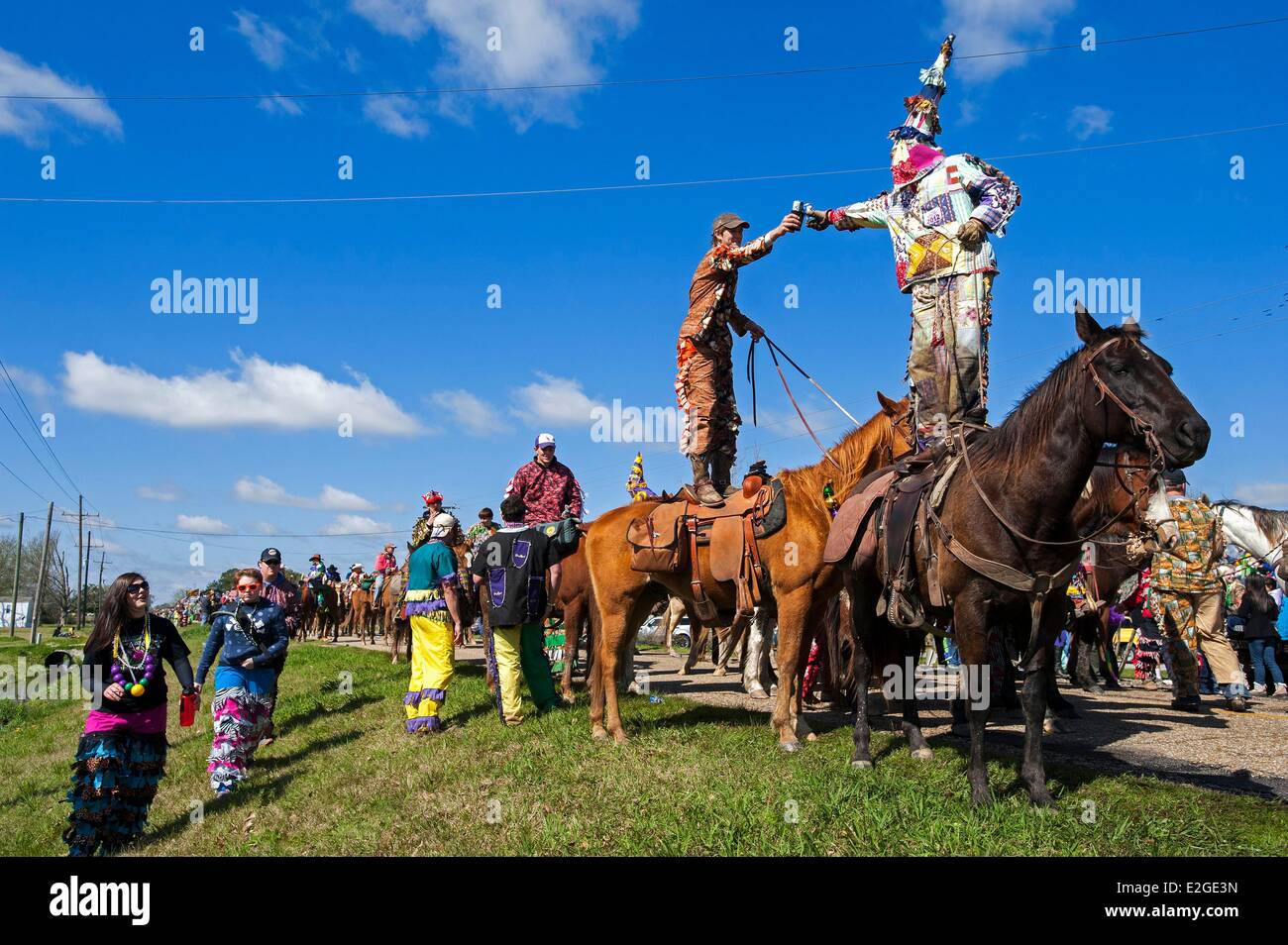 Vereinigten Staaten Louisiana Churchpoint Courir de-Karneval ist ein Cajun Tradition, die jedes Jahr während Karneval in diesem französischen Sprachraum bunt kostümierte stattfindet, und Kapuzenmänner Haus zu Haus zu gehen, zu Fuß oder zu Pferd betteln um Geld oder Leben von pou Stockfoto