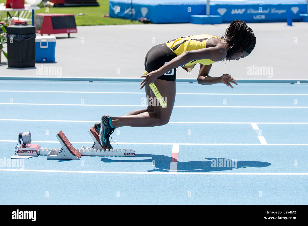 In den Startlöchern für die Metro 4X400M Damenstaffel beim 2014 Adidas Track &amp; Field-Grand-Prix. Stockfoto
