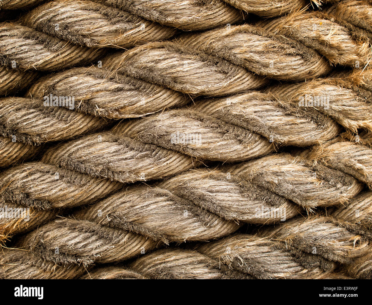 Alten verwitterten Seil nach unten getragen werden, um einzelne Stränge verfügbar machen Stockfoto