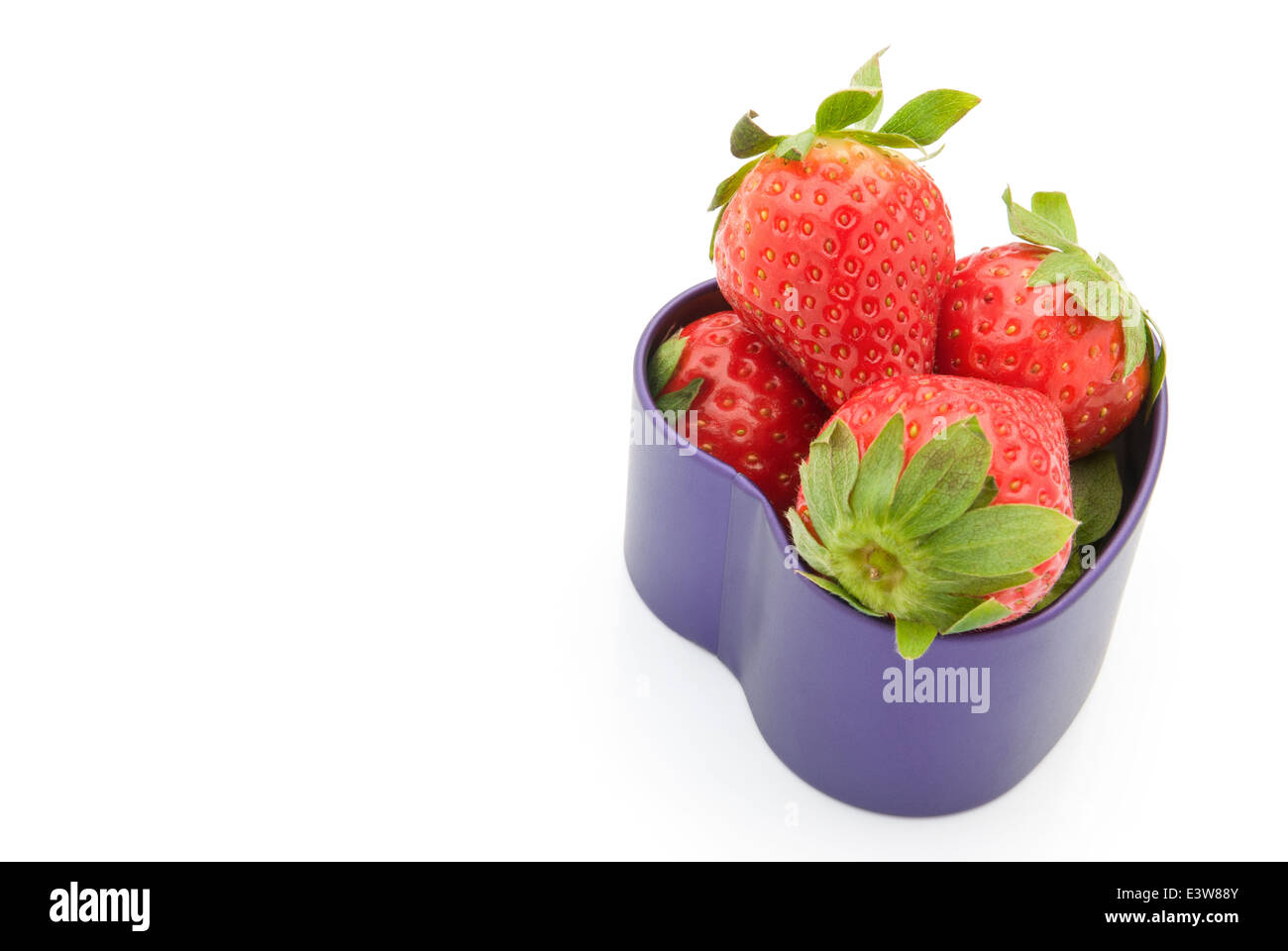 Erdbeeren in Form eines Herzens können Stockfoto