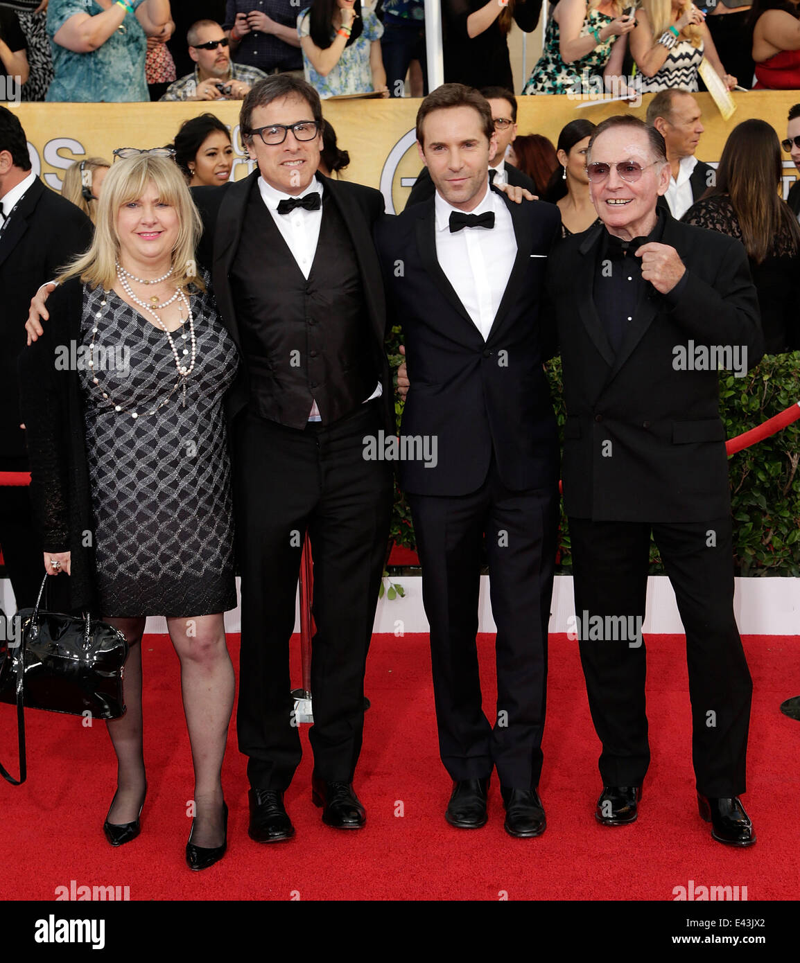 Die 20. Annual Screen Actors Guild (SAG) Awards statt in The Shrine Auditorium - Ankünfte Featuring: Colleen Camp, David O. Russell, Alessandro Nivola, Paul Herman wo: Los Angeles, California, Vereinigte Staaten von Amerika bei: 18. Januar 2014 Stockfoto