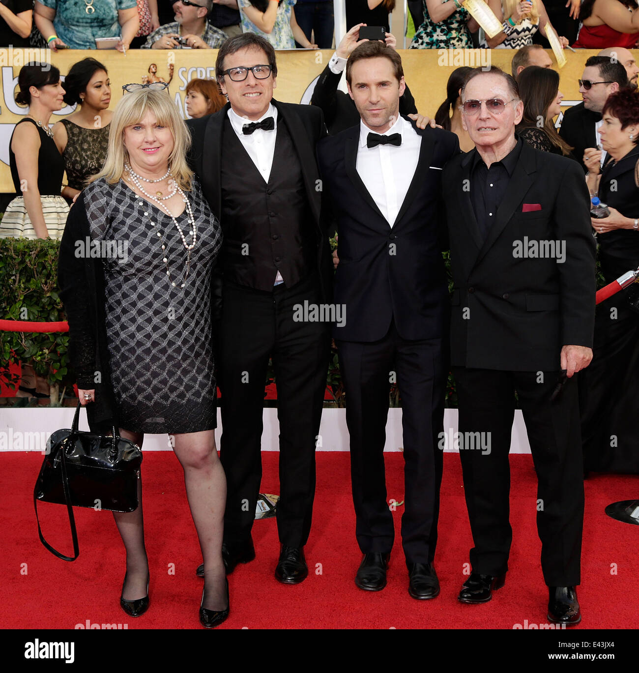 Die 20. Annual Screen Actors Guild (SAG) Awards statt in The Shrine Auditorium - Ankünfte Featuring: Colleen Camp, David O. Russell, Alessandro Nivola, Paul Herman wo: Los Angeles, California, Vereinigte Staaten von Amerika bei: 18. Januar 2014 Stockfoto