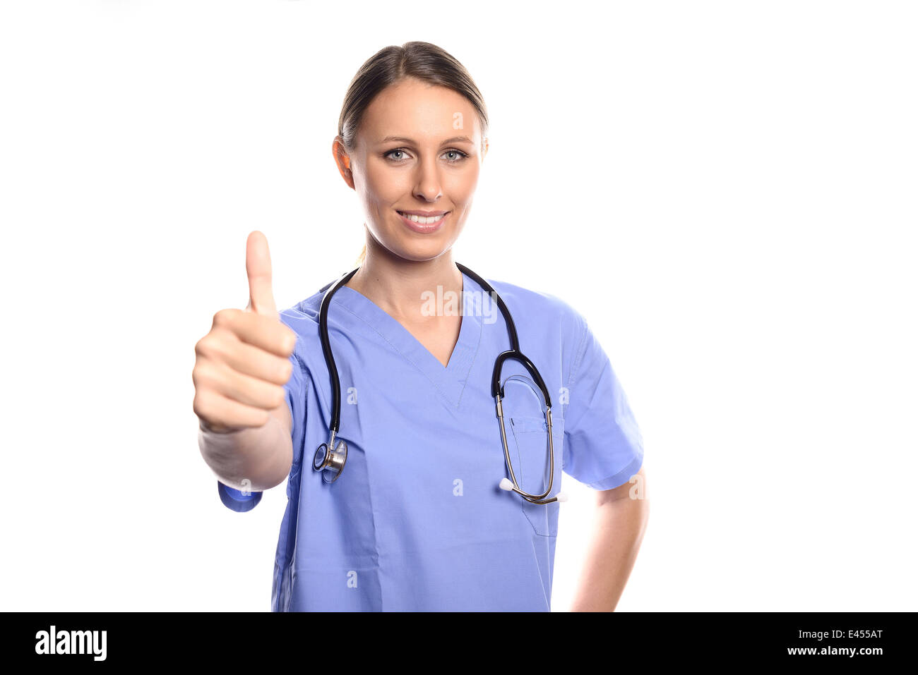Junge weibliche Krankenschwester oder Arzt in blau scheuert ihre Daumen hochhalten, Erfolg, Glück oder generische Glück hinweisen Stockfoto