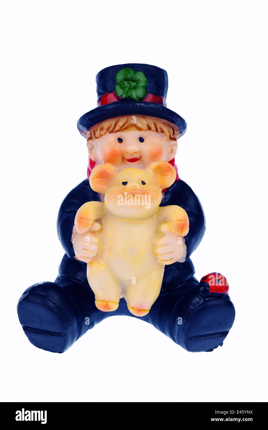 Ein Schornsteinfeger und ein Schwein als Glücksbringer für das neue Jahr und Silvester Eve Stockfoto