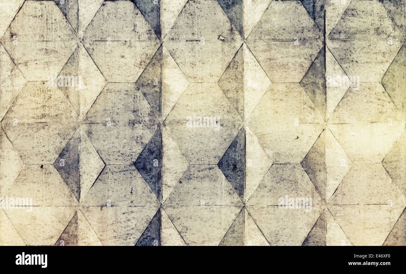 Hintergrundtextur von alten grauen Betonzaun mit Karomuster, getönten Effekt Stockfoto