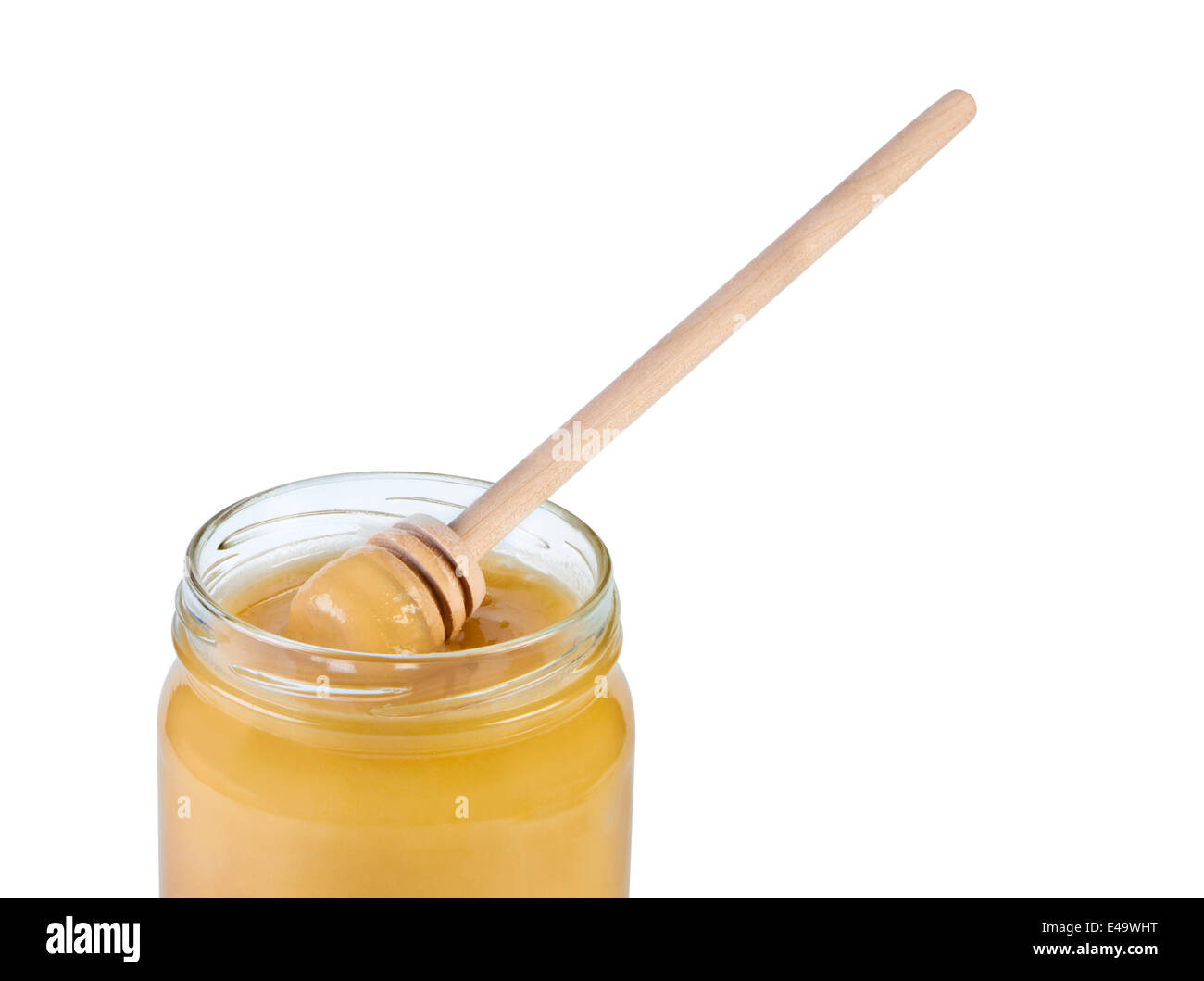 Glas Honig und Holzlöffel. Stockfoto
