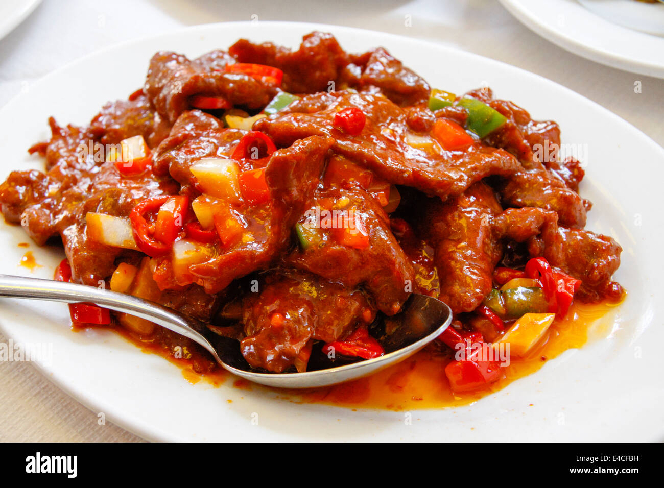 Chinesisches Gericht spicy Szechuan/Sichuan Rindfleisch mit Chilis, Soho, London, England, UK Stockfoto