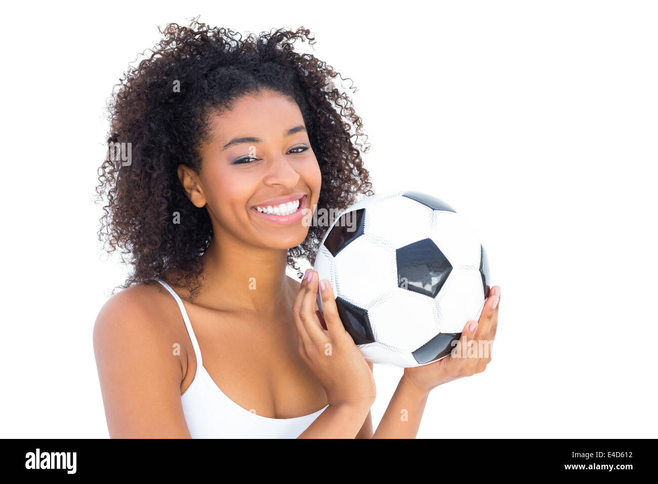 Hübsches Mädchen Fußball halten und Lächeln in die Kamera Stockfoto