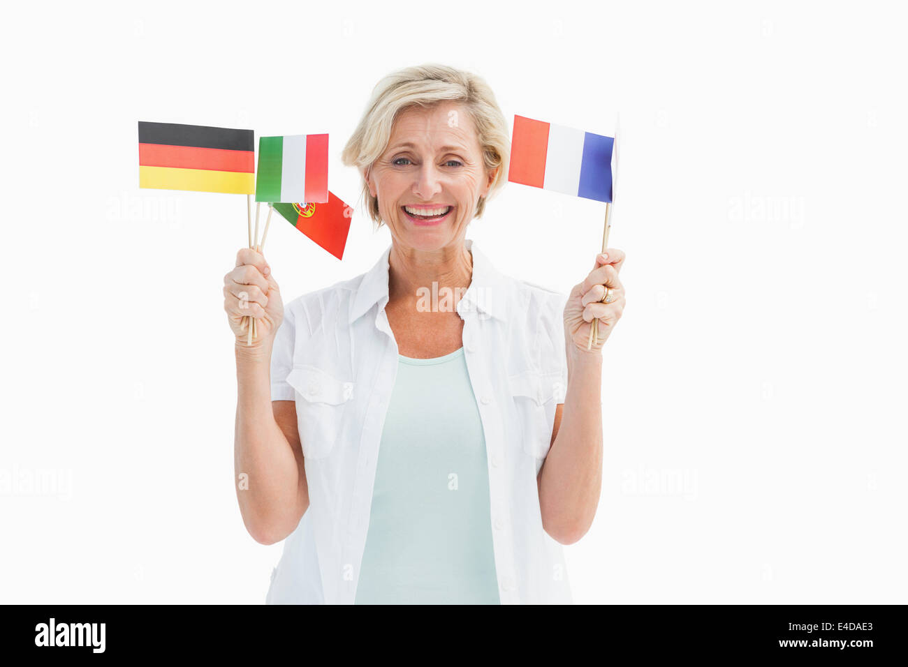 Reife Frau glücklich halten Flaggen Stockfoto