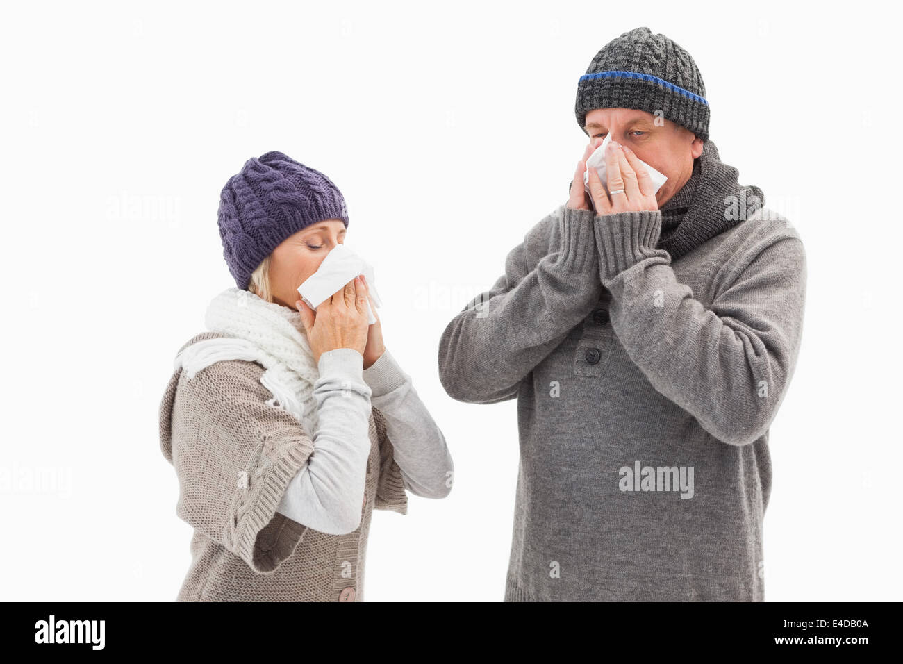 Krank älteres Paar die Nase weht Stockfoto