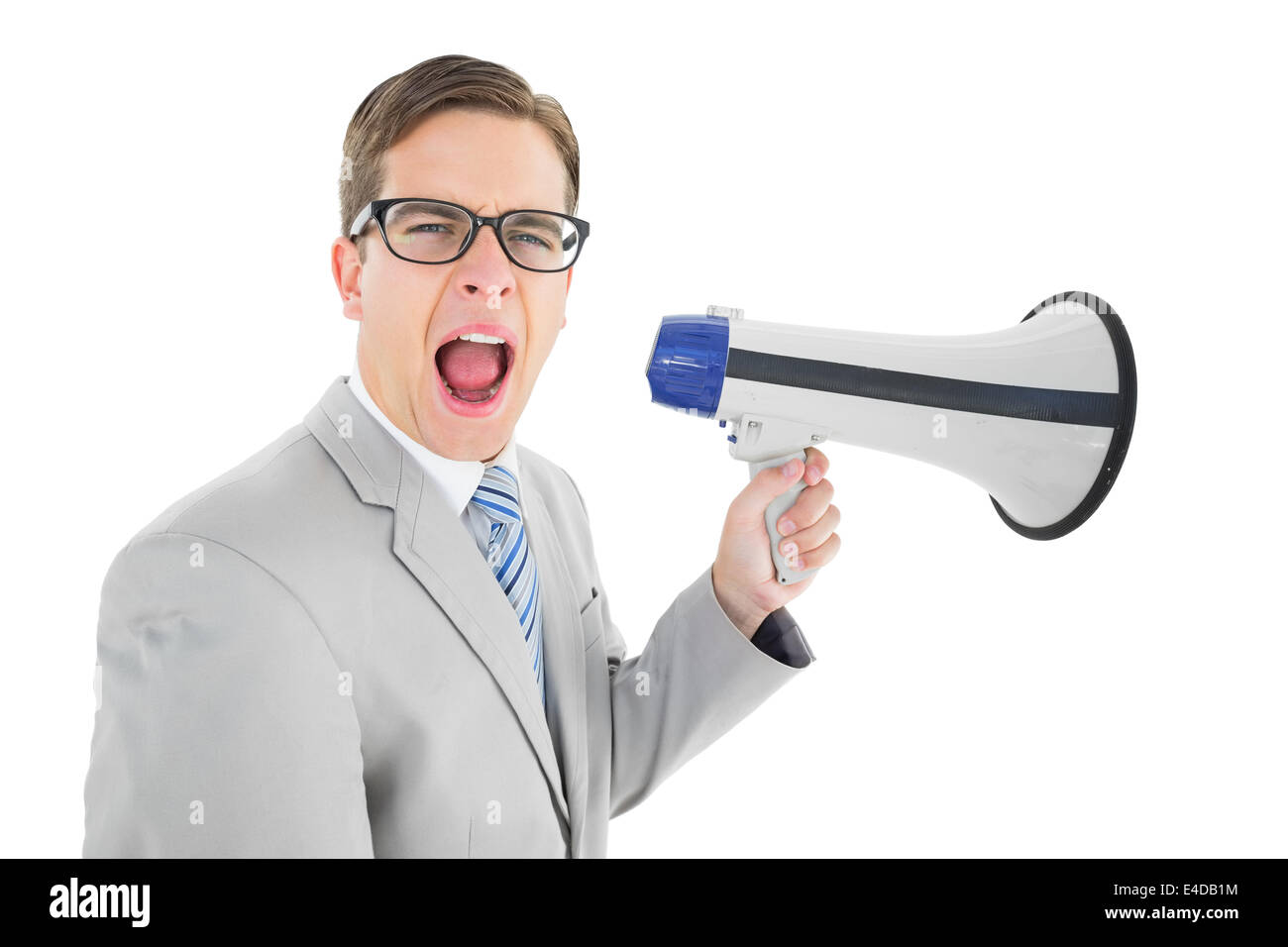 Geeky Geschäftsmann durch Megaphon schreien Stockfoto