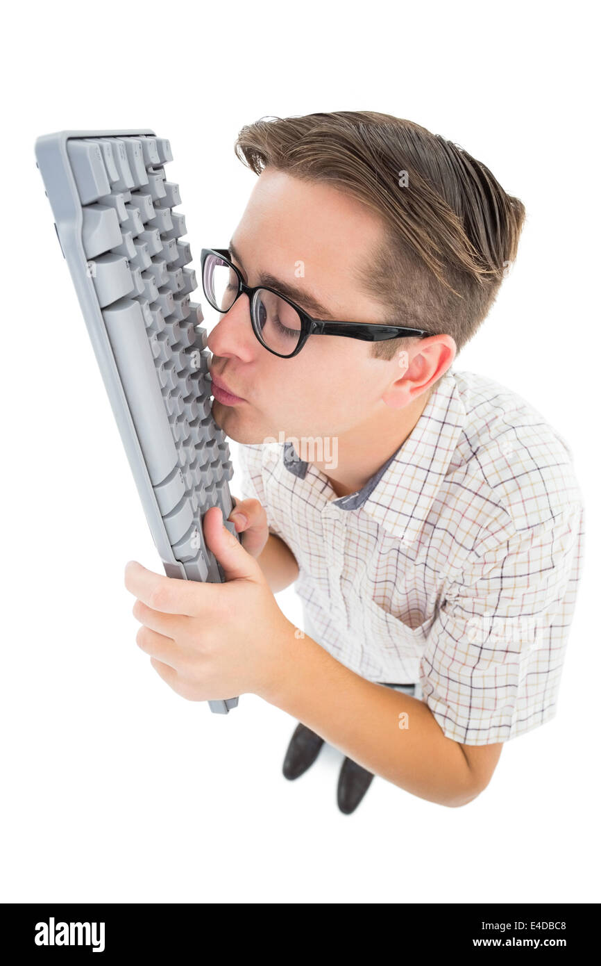 Geeky Hipster küssen seine Tastatur Stockfoto