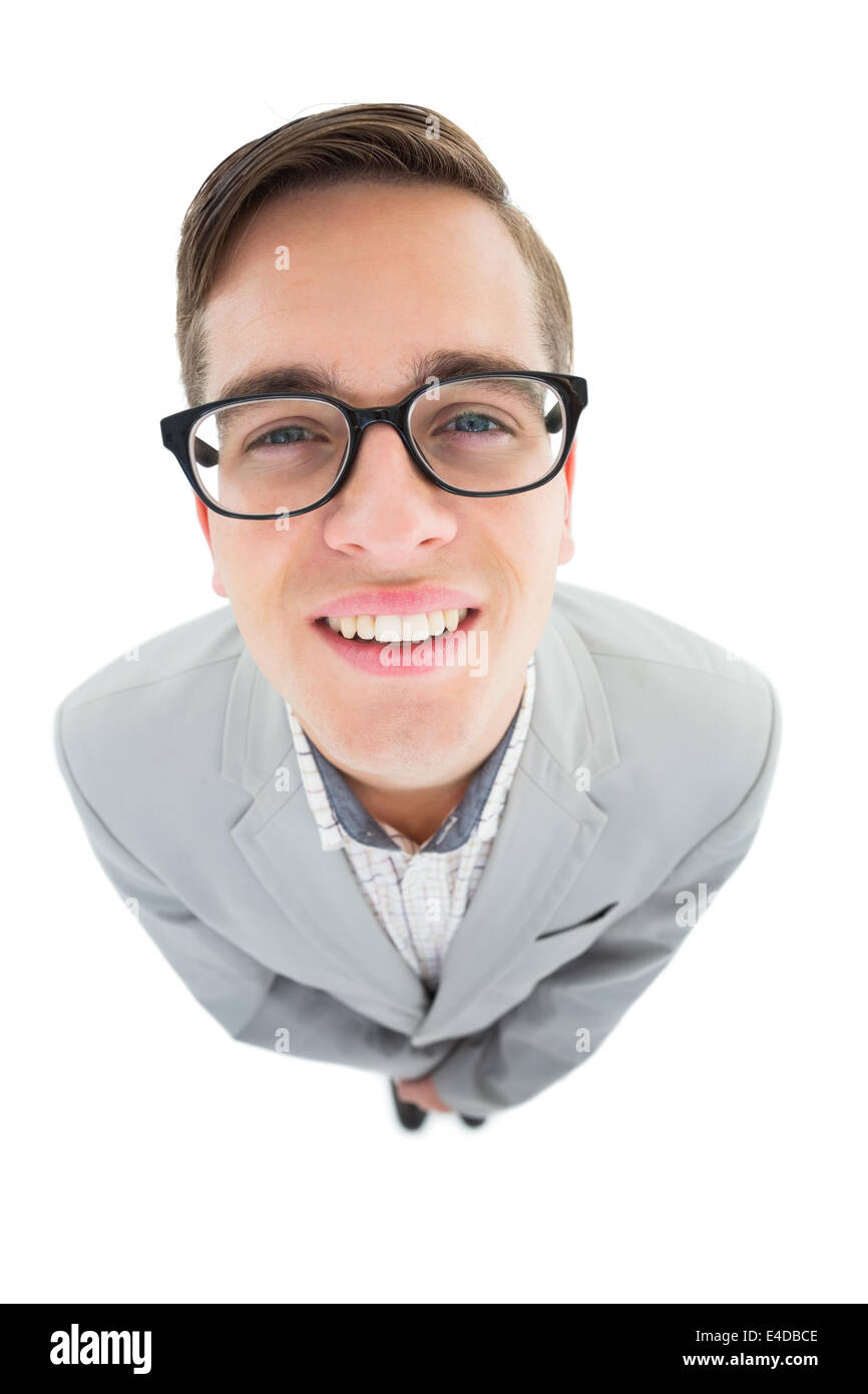 Geeky Hipster lächelnd in die Kamera Stockfoto
