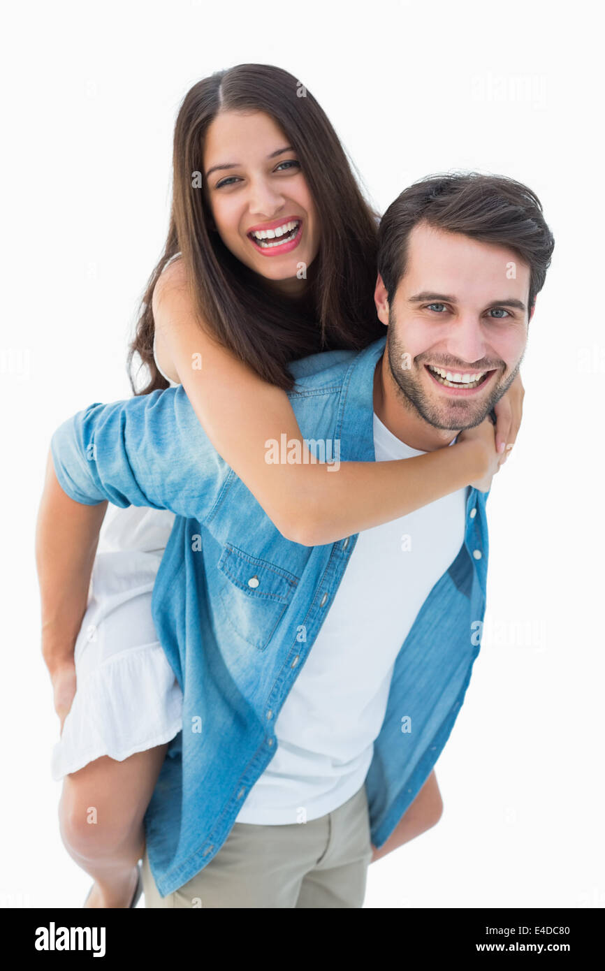 Glücklich mit seiner Freundin eine Huckepack hipster Stockfoto
