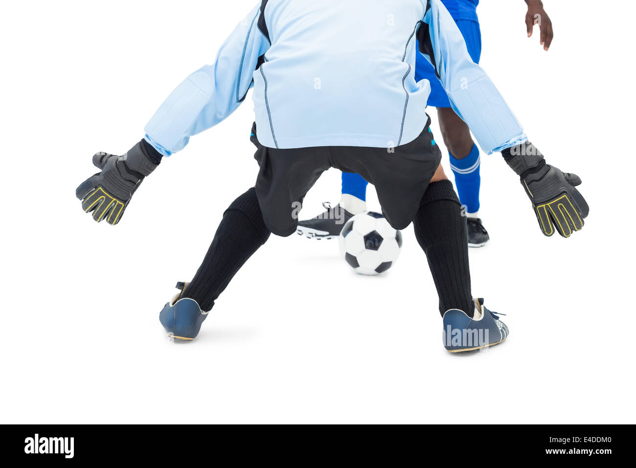 Stürmer trifft Fußball Torwart Stockfoto