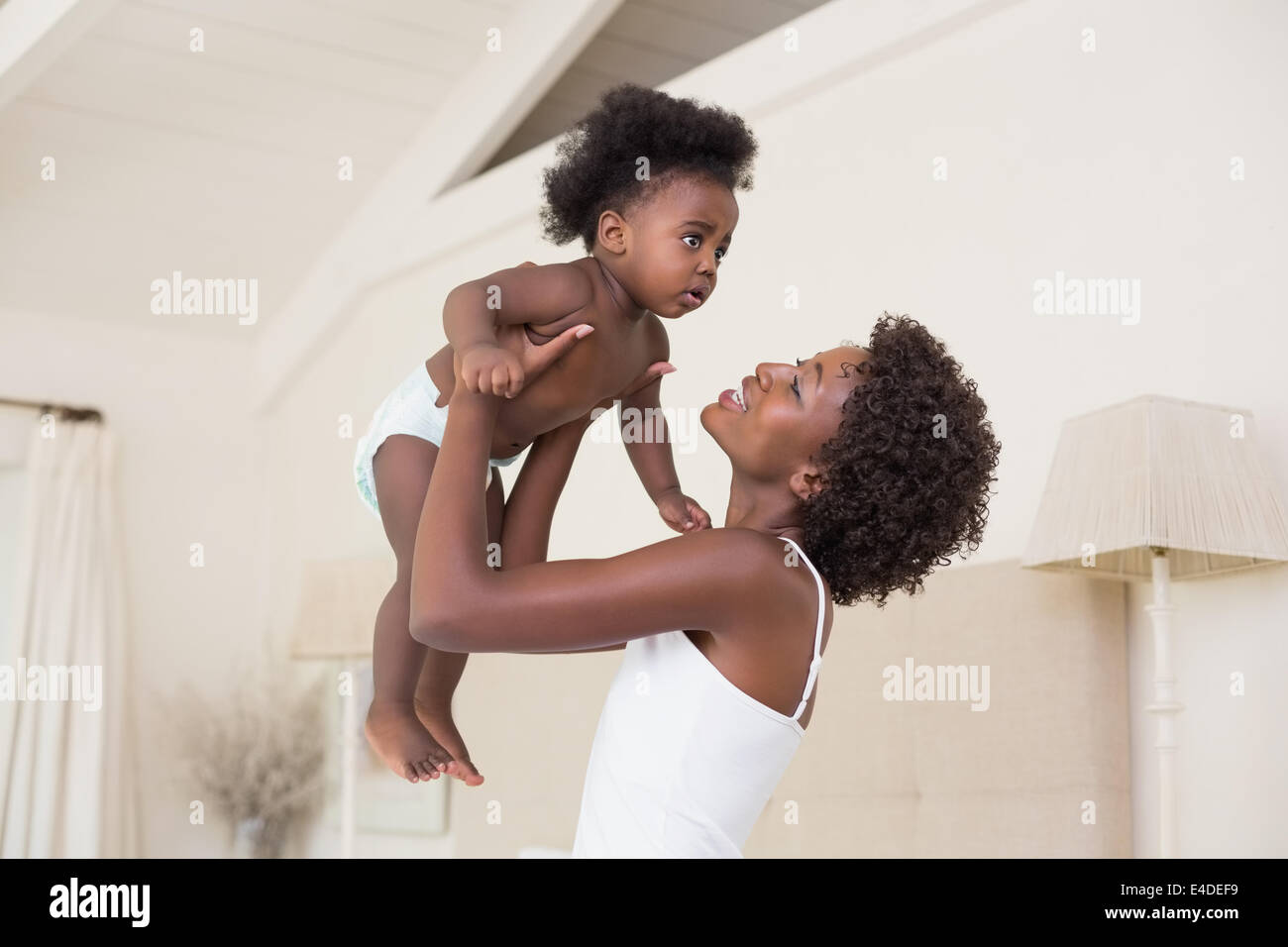Glückliche Mutter mit Baby girl Stockfoto
