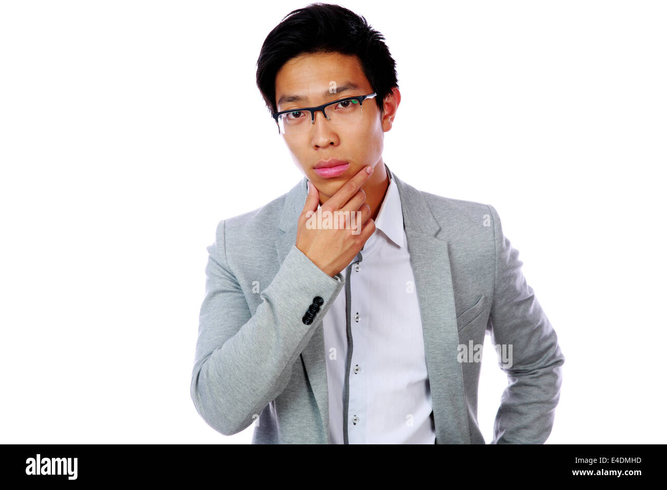 Porträt eines nachdenklich asiatischen isoliert auf weißem Hintergrund Stockfoto
