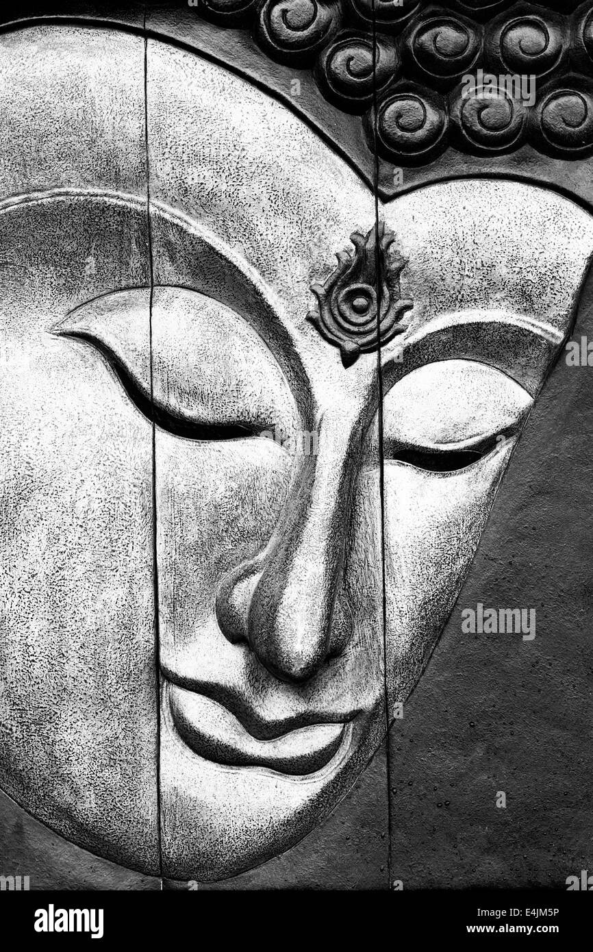 Hölzerne Buddha schwarz / weiß Stockfoto