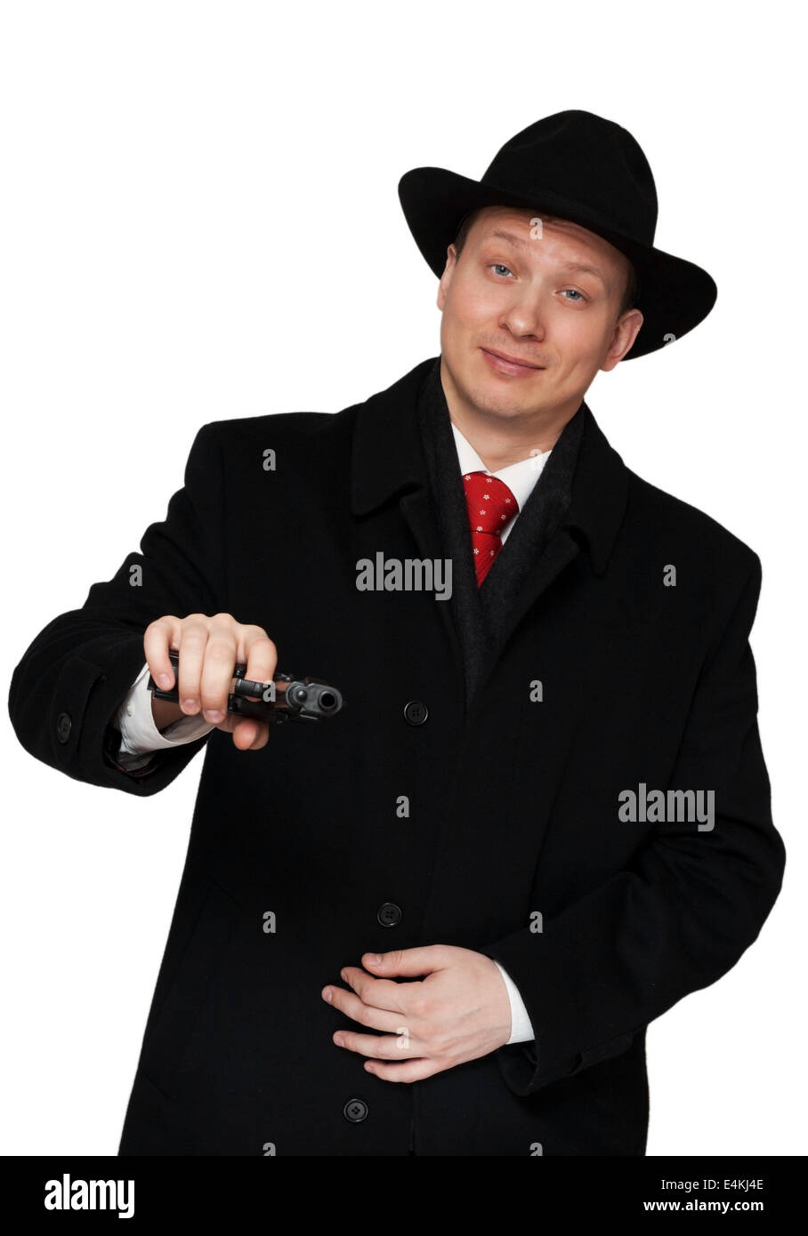 Mann in einem schwarzen Mantel und Hut Stockfoto