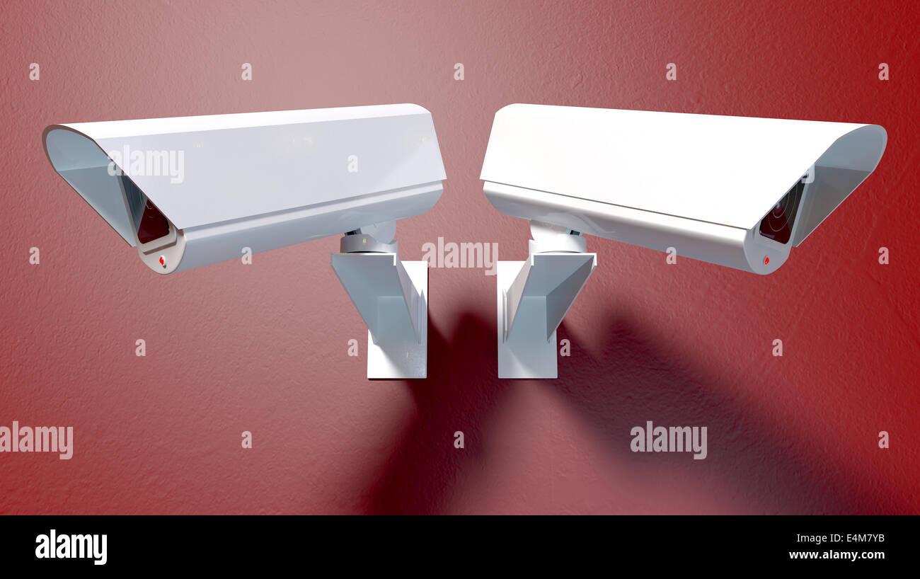 Zwei weiße drahtlose Überwachungskamera mit beleuchteten Lichter montiert auf einem isolierten roten Wand mit Textfreiraum Stockfoto