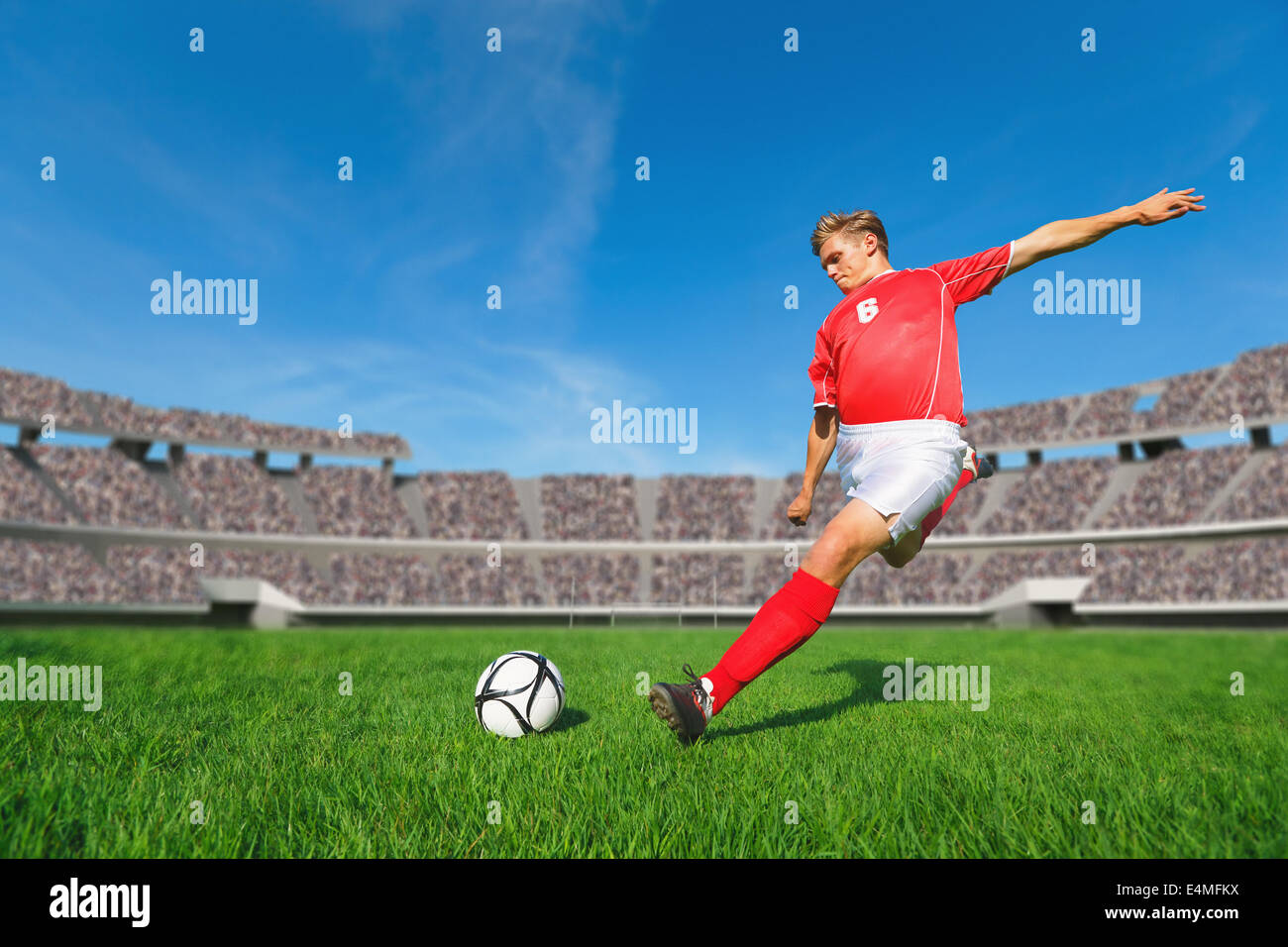 Fußball-Spieler den Ball Stockfoto