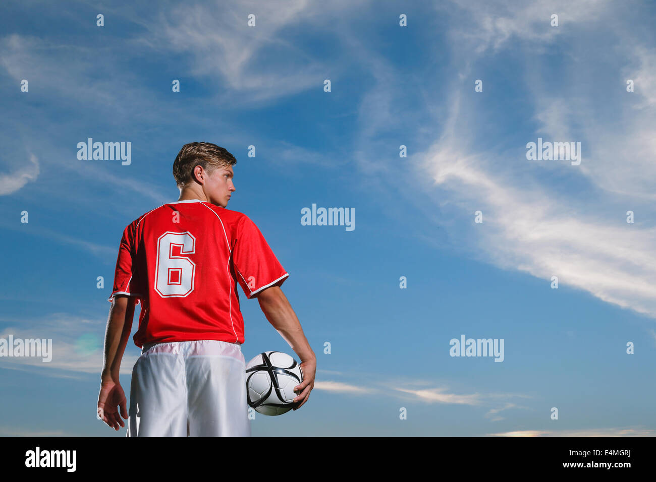 Fußballspieler mit Ball Stockfoto