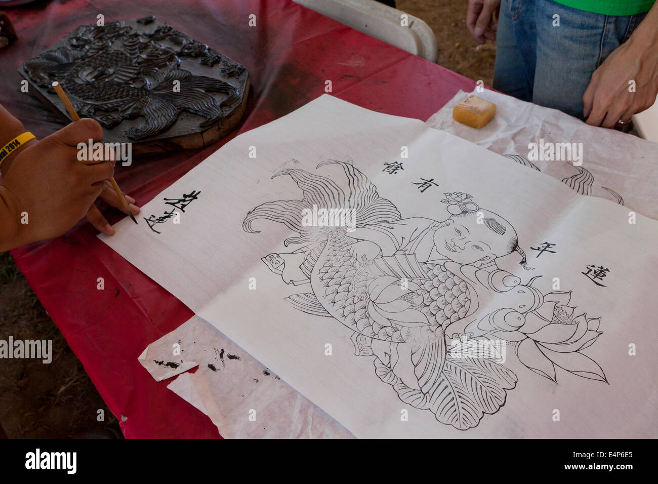 Mann Unterzeichnung chinesische Holzschnitt Stockfoto