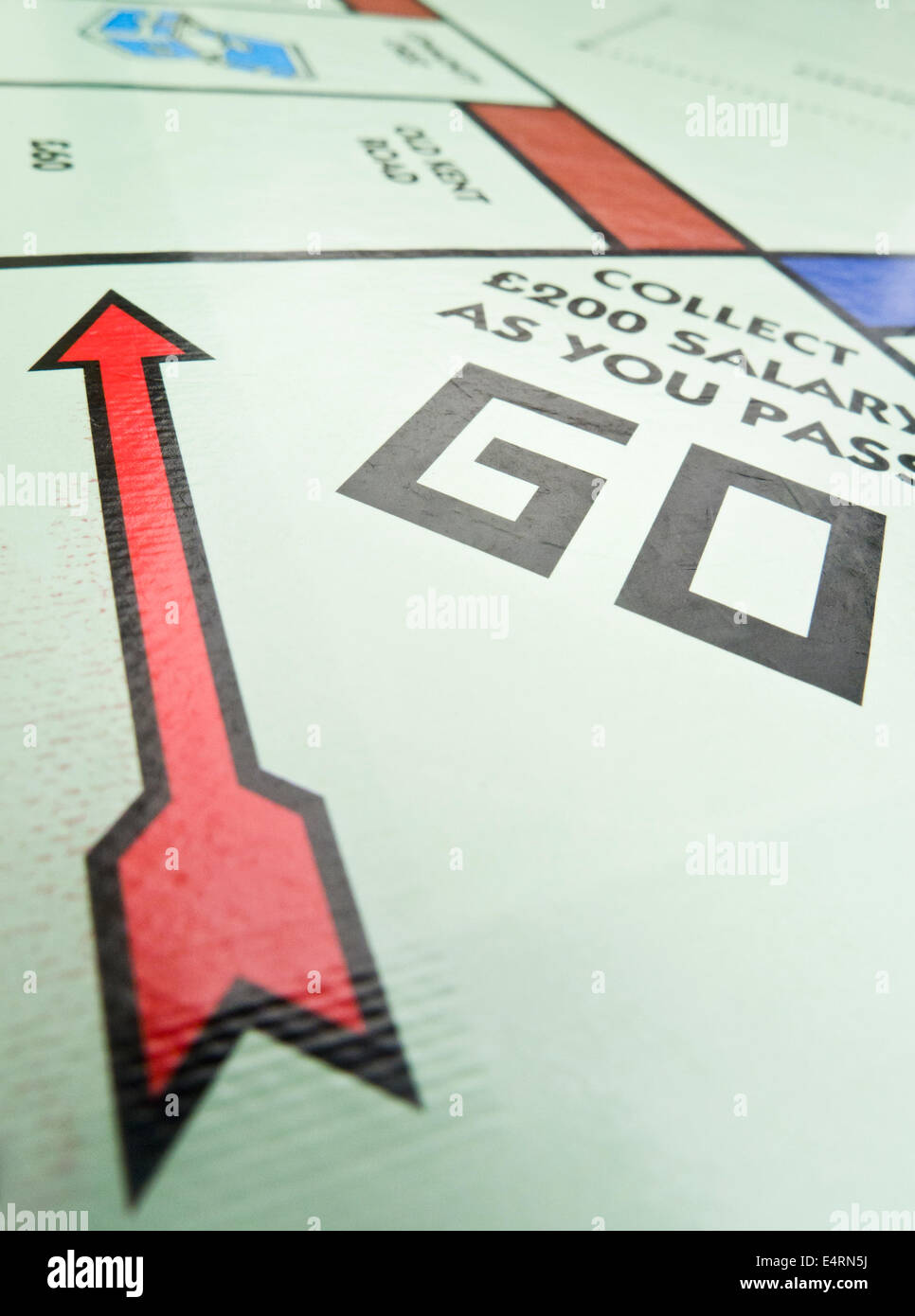 "GO" Platz auf dem Monopoly-Brett. Stockfoto
