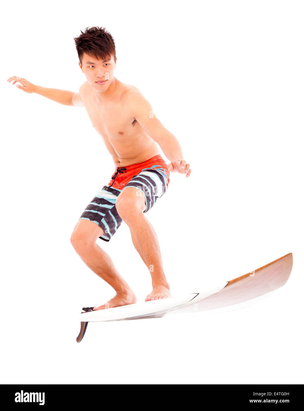 junge Surfer Praxis Surfen pose Stockfoto