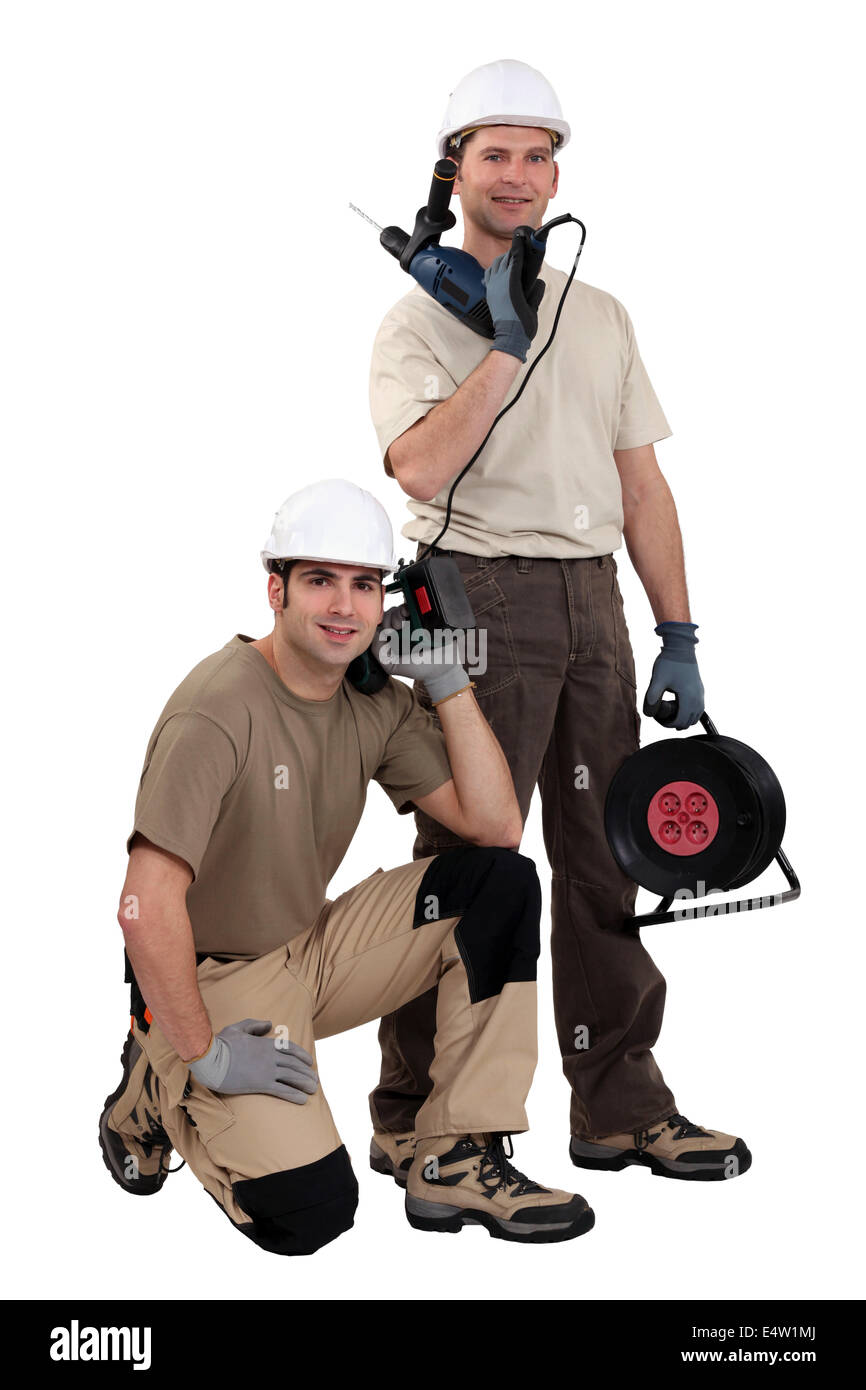Handwerker mit ihren Werkzeugen Stockfoto