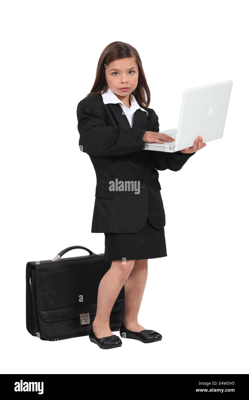 Kind, die vorgibt, eine Geschäftsfrau Stockfoto