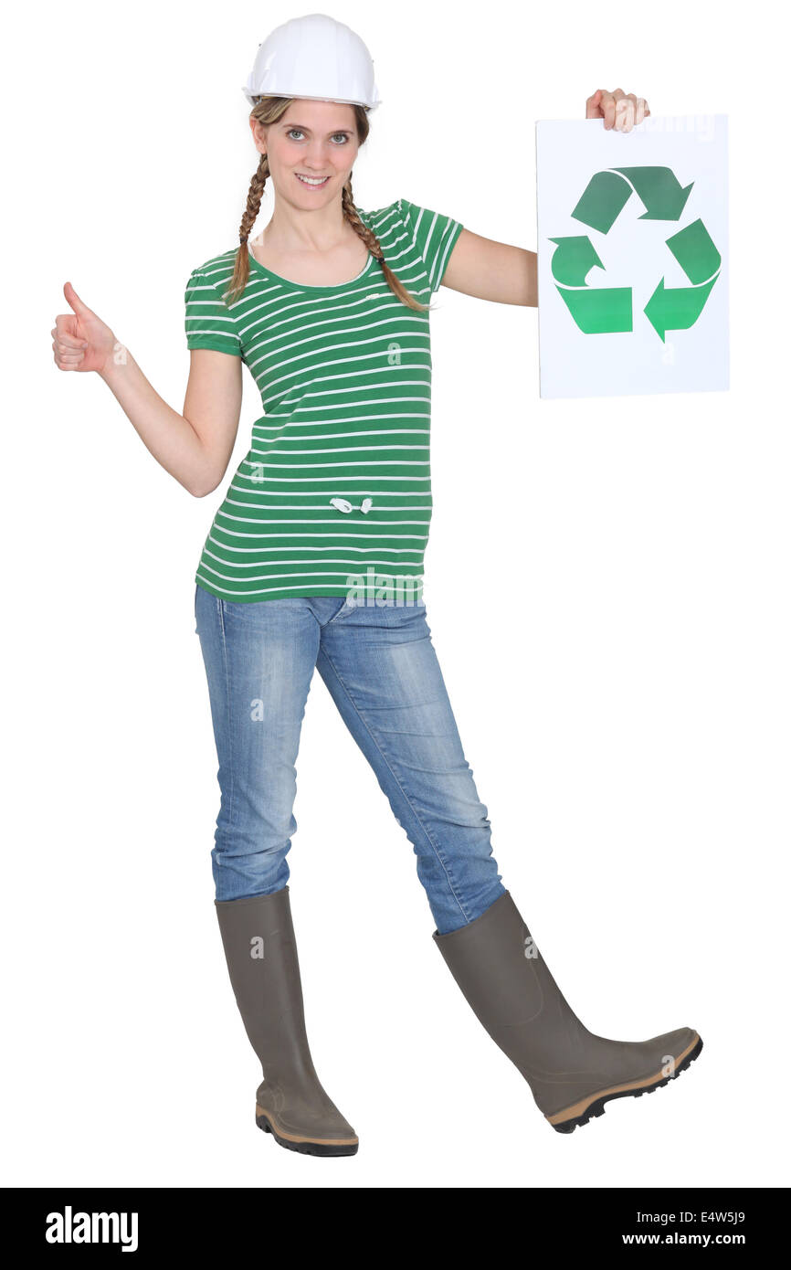 Webermeisterin hält das recycling-symbol Stockfoto