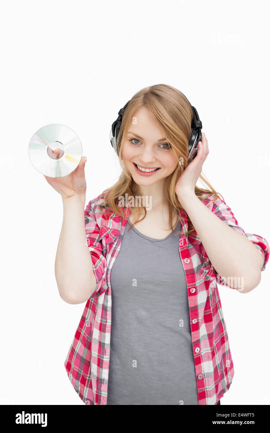 Frau, eine cd mit gedrückter Stockfoto