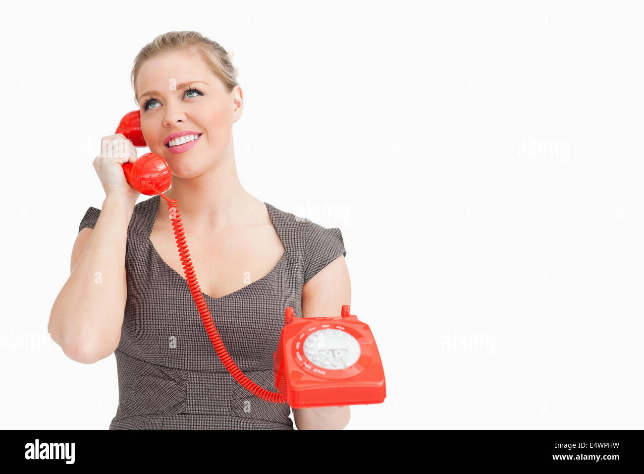 Frau mit jemandem am Telefon anrufen Stockfoto