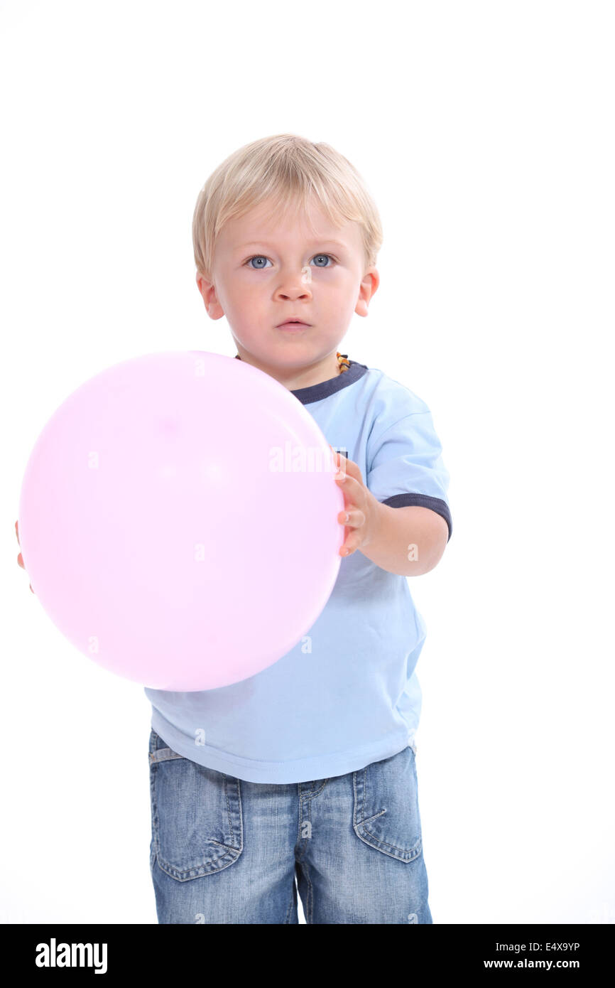 Kind mit rosa Ballon Stockfoto