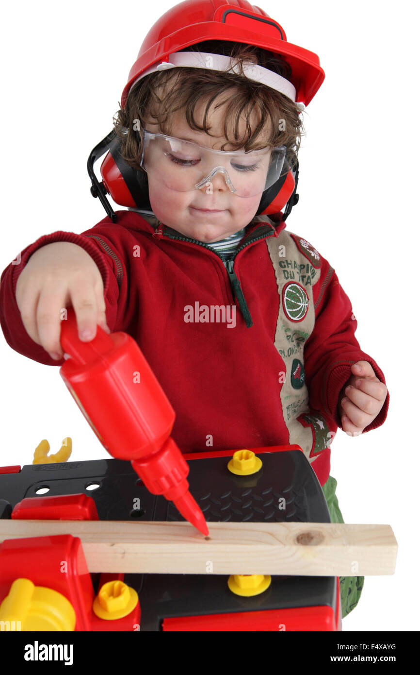 Kleine Jungen spielen Baumeister Stockfoto